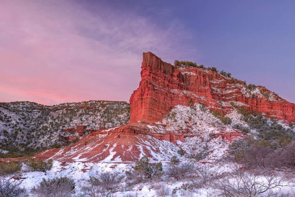 Winter sunrise on the face of a rock outcropping in the caprock canyons of West Texas.